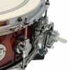 Close-up of DW Design Frequent Flyer 20in snare drum with chrome hardware.
