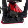 Close-up of DW 5000 single bass drum pedal with black footplate and red frame.