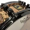 Close-up of Mapex Black Panther 14x5.5in snare drum with bronze hammered finish.