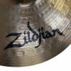 Close-up of Zildjian logo on 14-inch ZXT solid hi-hats cymbals.