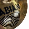 Close-up of Sabian cymbal with detailed grooves and logo.