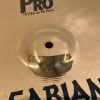Close-up of a Zildjian 14-inch hi-hat cymbal with reflective surface.