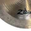 Close-up of Zildjian ZXT 18in Total China cymbal with visible grooves.