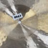 Close-up of a shiny cymbal with signature and sticker from Drummers Only.