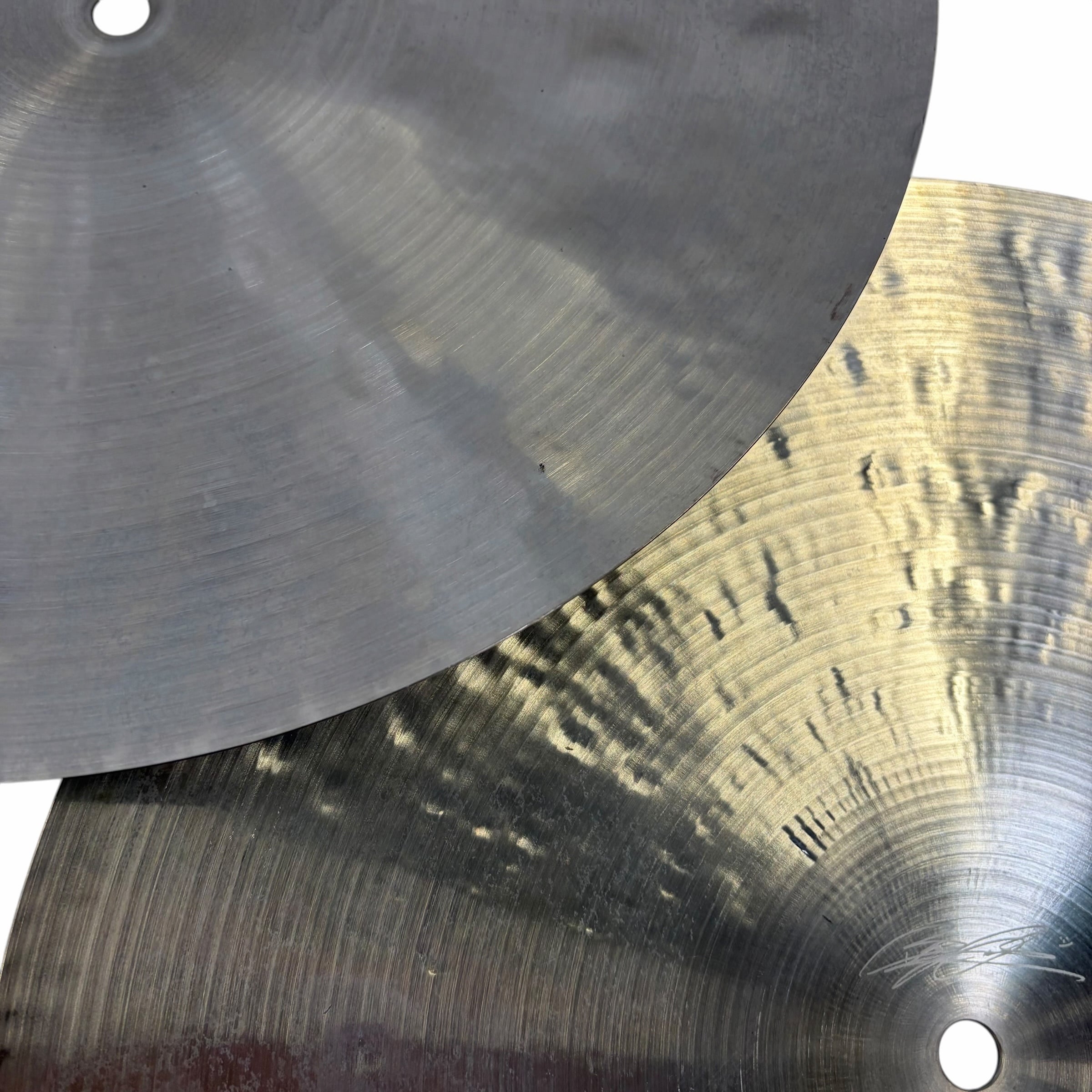 Close-up of 14-inch sand finish hi-hat cymbals for drumming.