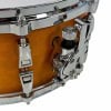 Close-up of Yamaha Absolute Hybrid Maple 14x6in snare drum with natural wood finish.