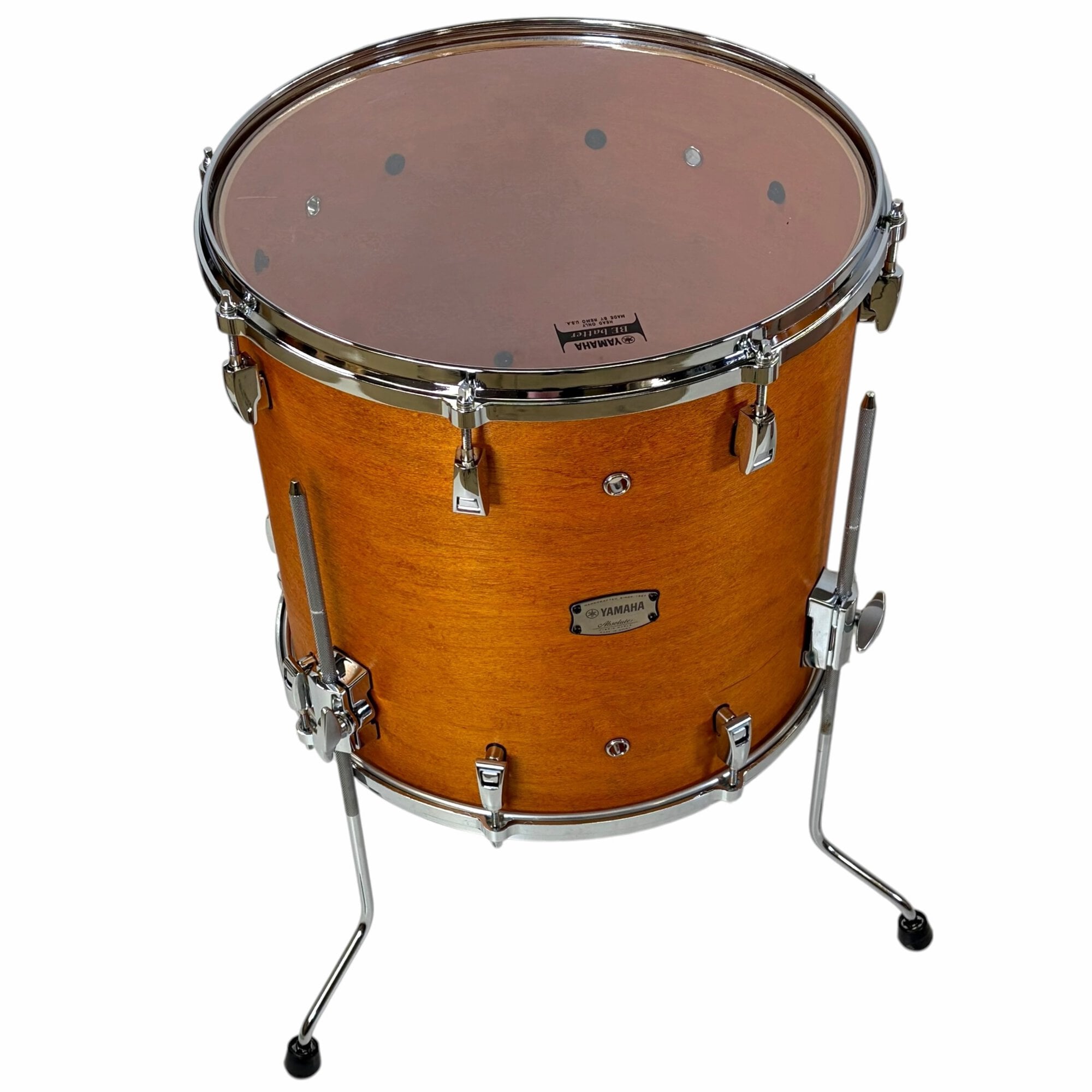 Yamaha Absolute Hybrid Maple 22in shell drum on stand in vintage natural finish.