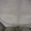 Close-up of granite drum case with minor scratch detail.
