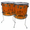 Orange Ludwig Vistalite drum shells with chrome hardware and stands.