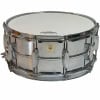 Ludwig Vistalite snare drum with chrome hardware and white shell.