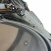 Close-up of drum hardware showing chrome finish and minor rust specks.