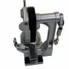 Close-up of a silver drum pedal with black strap and springs.