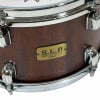 Tama SLP 12x7 inch snare with wood finish and chrome hardware.