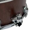 Tama Snare Drum with chrome hardware and wooden shell.