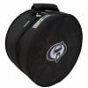 Round black drum snare case with Drummers Only logo and handles.