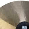 Close-up of a Meinl Byzance polyphonic crash cymbal surface.