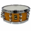 Mapex Black Panther snare drum with quilted wood finish and chrome hardware.