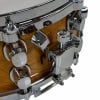 Mapex Black Panther snare drum hardware and wood shell close-up.