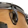 Yamaha Steve Jordan signature snare with tuning rod and rim in close-up.