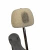 Close-up of a Tama Camco pedal with a worn beige drum pad and chrome rod.
