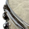 DrumsOnly close-up of birch snare drum rim and lugs.