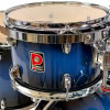Premier Birch 20in drum shell with blue finish and chrome hardware.