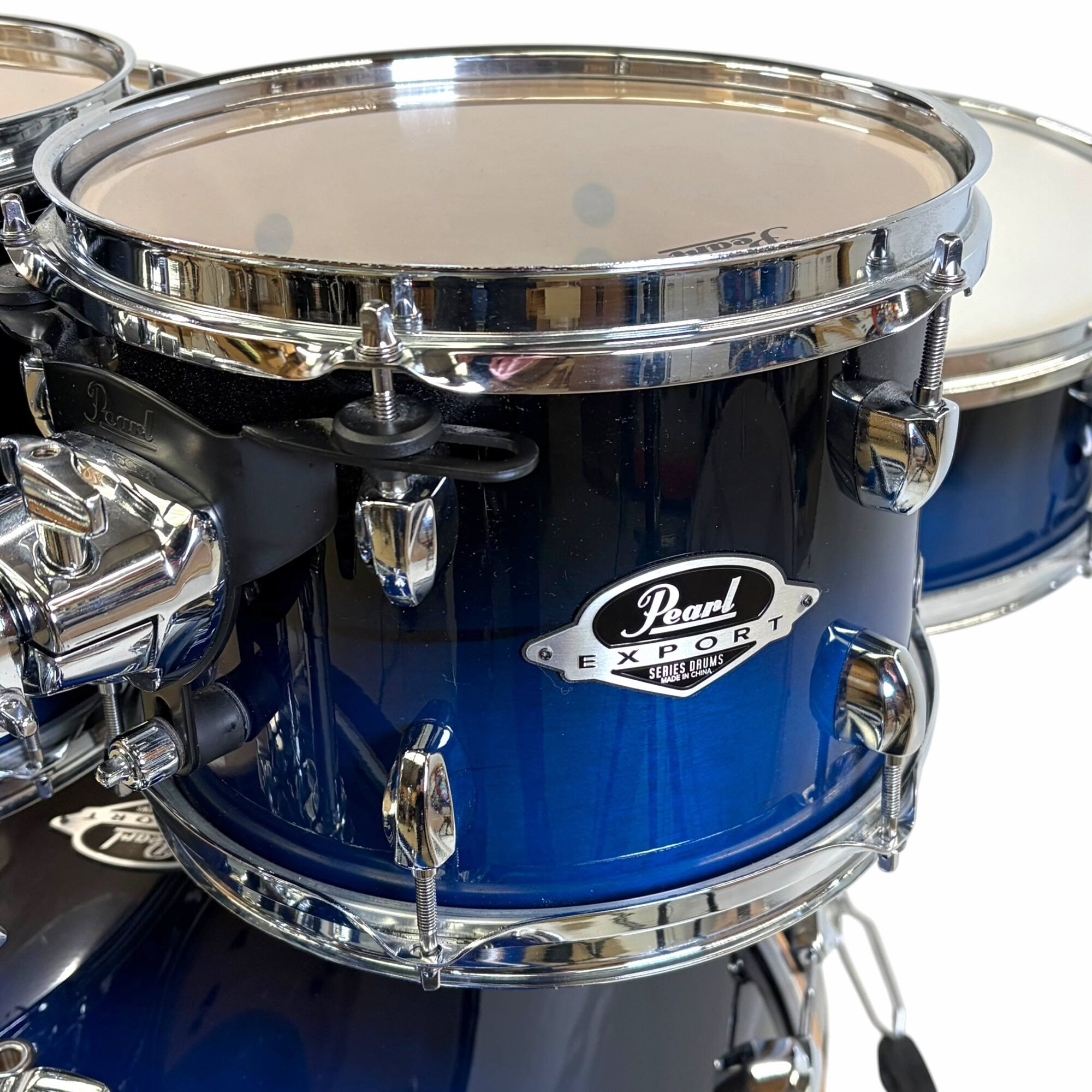 Pearl Export snare drum from Drummers Only, blue finish with chrome hardware.