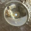 Close-up of a shiny Istanbul Mehmet Samatya 20-inch ride cymbal with a reflective surface.