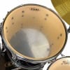 Close-up of Tama Imperial Star snare drum with drumsticks.