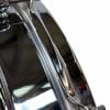 Close-up of Tama SLP Super Aluminium 14x5in snare drum with chrome finish.