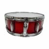 Red snare drum with chrome hardware for drumming enthusiasts.