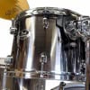 Close-up of Pearl Export drum with cymbals and hardware.