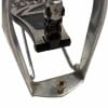 Close-up of a drum pedal and metal frame on a drum kit.